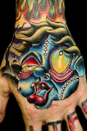 Tattoos - Movie Horror tattoos - zombie boy face with graveyard scene